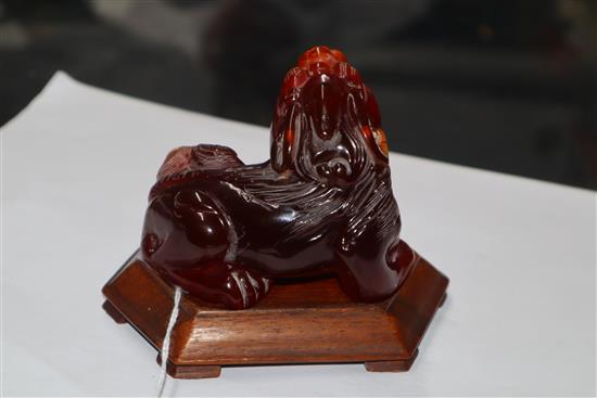 A Japanese ivory cane handle, a faux amber lion-dog and an enamel and ivory pill box